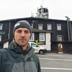 Jiří Králík on the summit of Plešivec (12.10.2025 16:27)